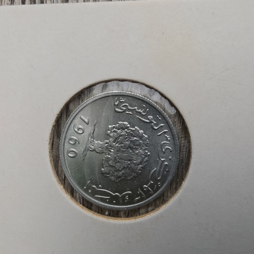 Afganistano 2 afgani monetą, nukaldintą 1960 metais. Afganistano 2 afgani monetą, nukaldintą 1960 metais.