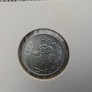 Afganistano 2 afgani monetą, nukaldintą 1960 metais. Afganistano 2 afgani monetą, nukaldintą 1960 metais.