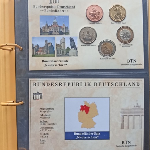 Albumas su Vokietijos žemių medaliais.