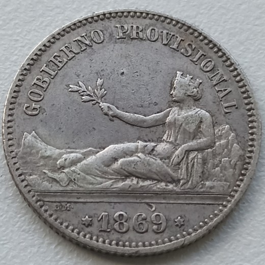 Ispanija. 1 peseta 1869 m. Sidabras. Ispanija. 1 peseta 1869 m. Sidabras.